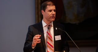 Mathis Wackernagel speaking at a lectern