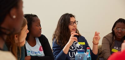 Students of UWC Robert Bosch College discussing at a round table