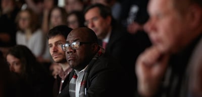 Laureates and students listening in the audience