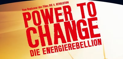 Detail of a film poster reading "Vom Regisseur des Films Die 4. Revolution: Power to Change, Die Energierebellion"