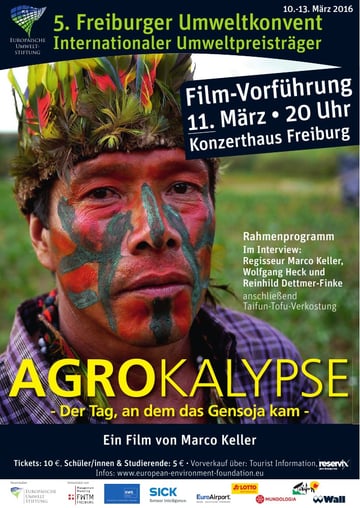 Flyer "5. Freiburger Umweltkonvent Internationaler Umweltpreisträger, 10.-13. März 2016: Film-Vorführung 11. März, 20 Uhr, Konzerthaus Freiburg, Agrokalypse, Der Tag, an dem das Gensoja kam, ein Film von Marco Keller" with a portrait of an indigenous man with face paint