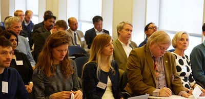 Audience seated in rows in a seminar room
