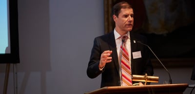 Mathis Wackernagel speaking at a lectern