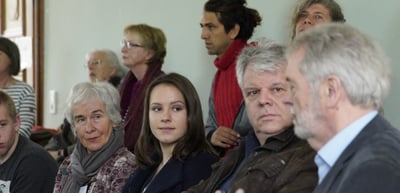 Laureates and students listening in the audience