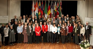 Participants of the 1st ICEL standing in front of national flags